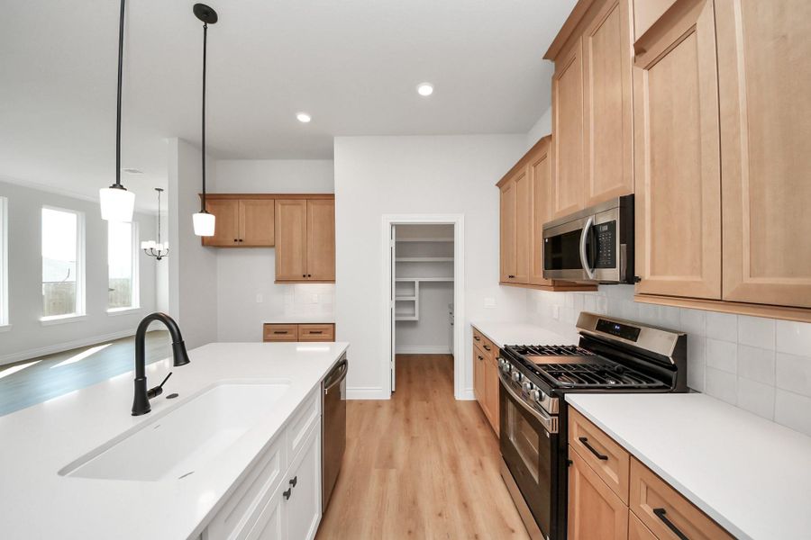 Furnished interior view inside a new home in Lexington Heights, Willis (Image 8).