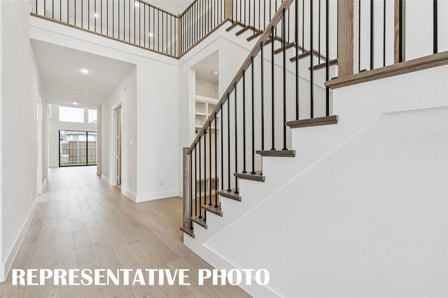 Offering a dramatic entry with site lines from the front through to the rear of the home, this beautiful entry is the perfect place to welcome friends and family into your fantastic new home!  REPRESENTATIVE PHOTO