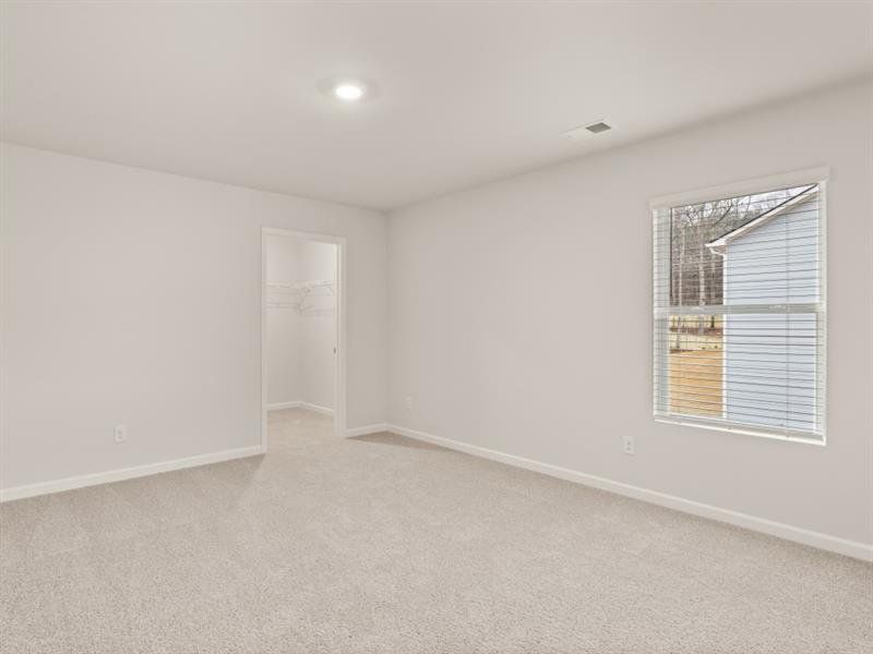 Spacious, unfurnished interior of a new home in Northwoods at Mirror Lake, Villa Rica (Image 42).