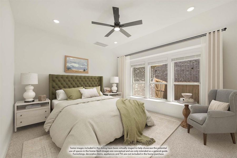 Bedroom with green tufted headboard, ceiling fan, large windows, and neutral carpet flooring