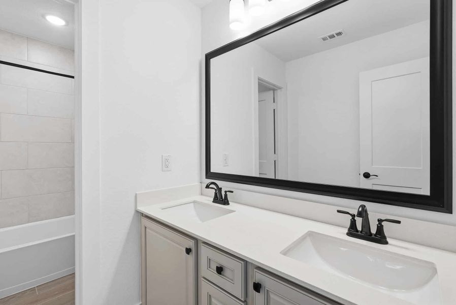 Furnished interior view inside a new home in Bridgeland, Cypress (Image 9). Furnished interior view inside a new home in Bridgeland, Cypress (Image 9).