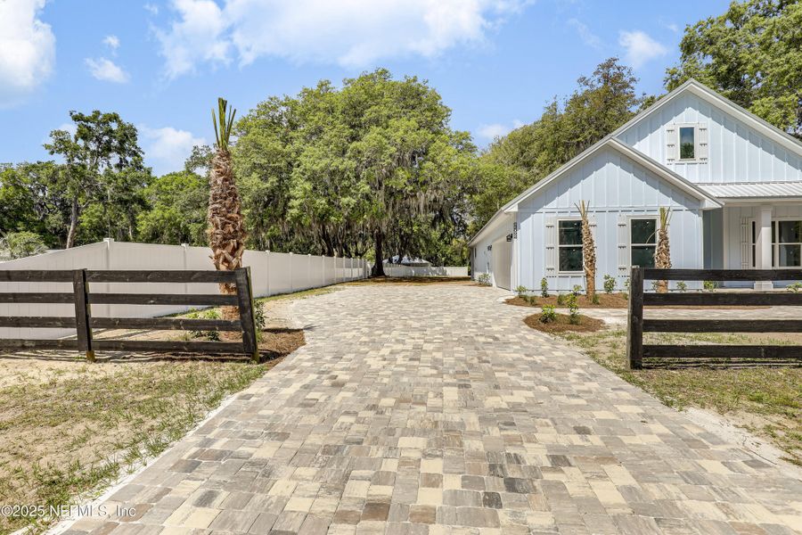 Front exterior of a new home in , Jacksonville, FL, highlighting curb appeal (Image 26).
