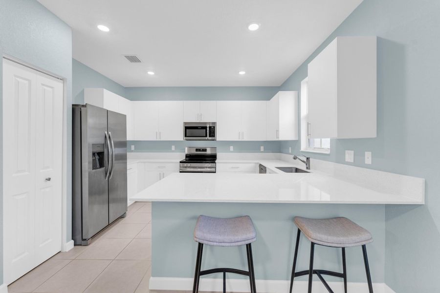 Furnished interior view inside a new home in , Coral Springs (Image 8).