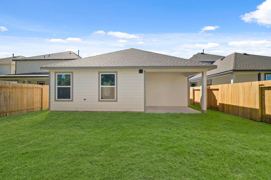 Exterior details and patio area of a home in Cypresswood Landing, Humble (Image 3).