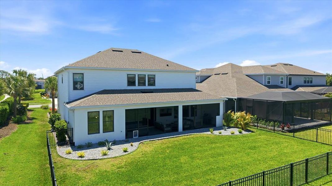 Exterior details and patio area of a home in , Sarasota (Image 24).