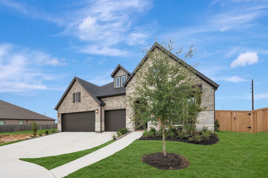 Front exterior of a new home in The Grand Prairie - Retreat Collection, Hockley, TX, highlighting curb appeal (Image 23).