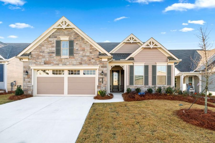 Front exterior of a new home in , Hoschton, GA, highlighting curb appeal (Image 24).