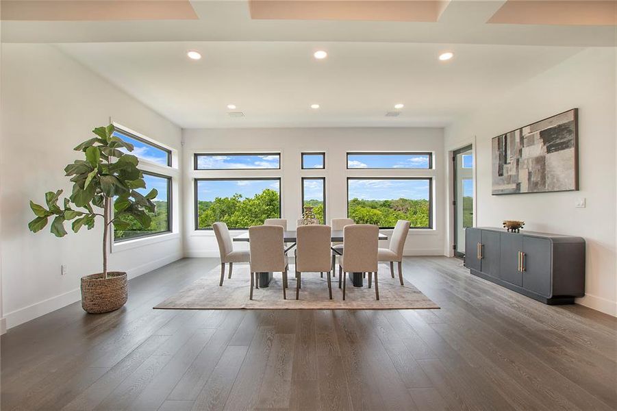 Dining room featuring dark wood-type flooring