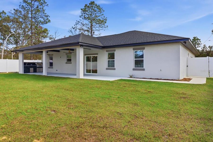 Exterior details and patio area of a home in , Citrus Springs (Image 19).