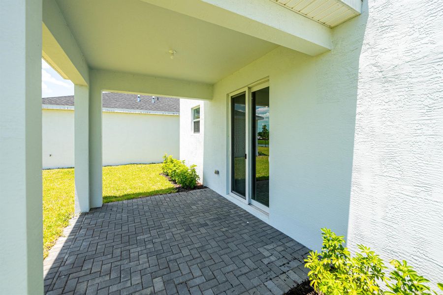 Front exterior of a new home in , Fort Pierce, FL, highlighting curb appeal (Image 1). Front exterior of a new home in , Fort Pierce, FL, highlighting curb appeal (Image 1).