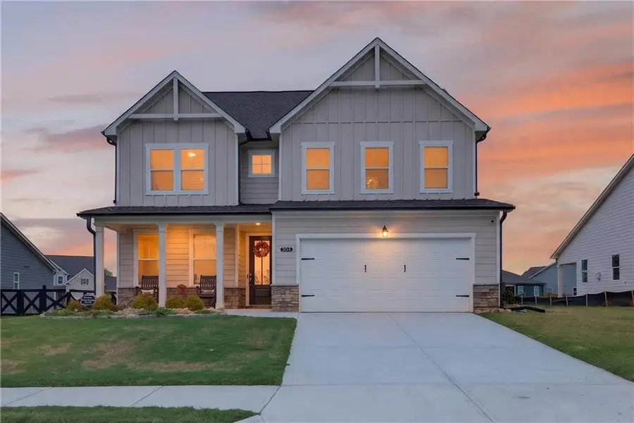 Front exterior of a new home in , Hoschton, GA, highlighting curb appeal (Image 2). Front exterior of a new home in , Hoschton, GA, highlighting curb appeal (Image 2).
