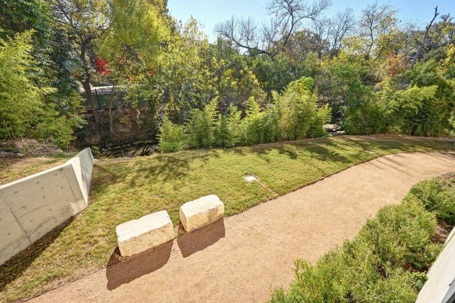 Surrounding community with a yard and a forest view Surrounding community with a yard and a forest view