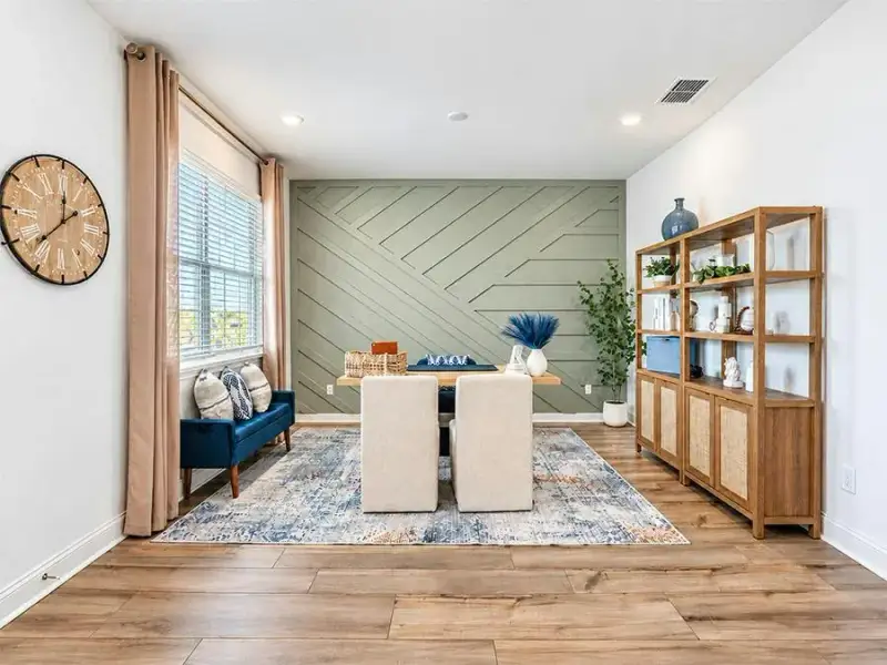 A den provides desirable flex-use space, with options to enclose with French doors or build as a 5th bedroom - Waylyn by Highland Homes