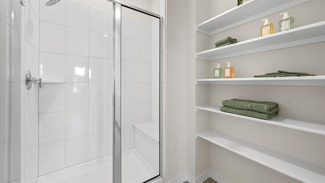 Bathroom featuring a shower stall