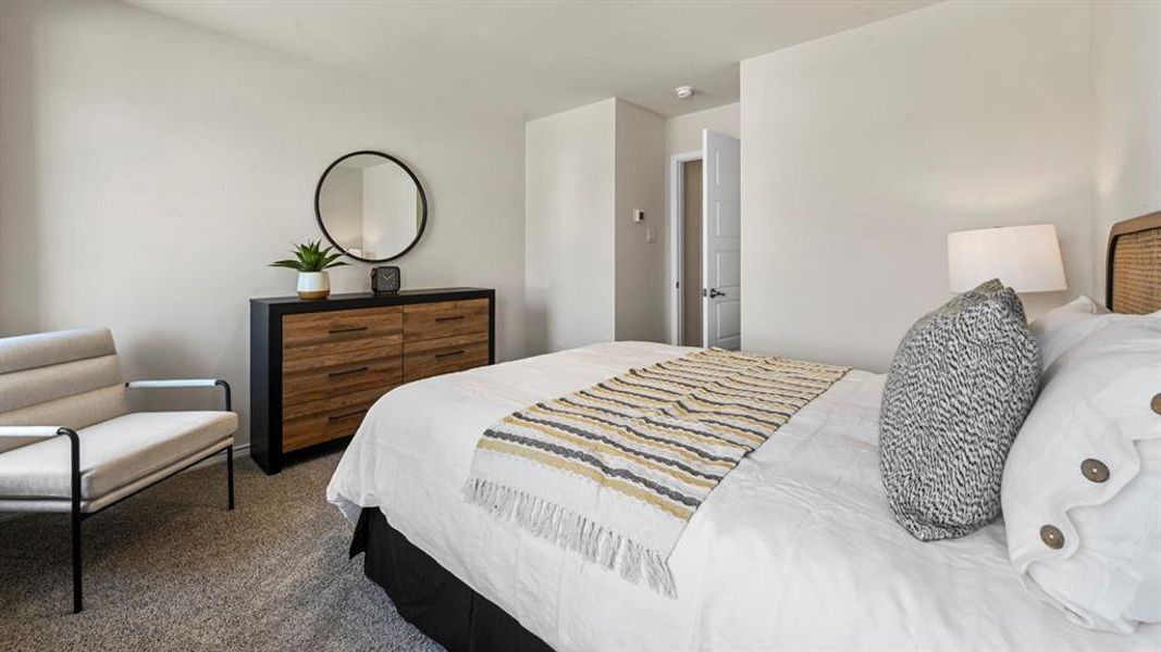 Bedroom featuring carpet Bedroom featuring carpet