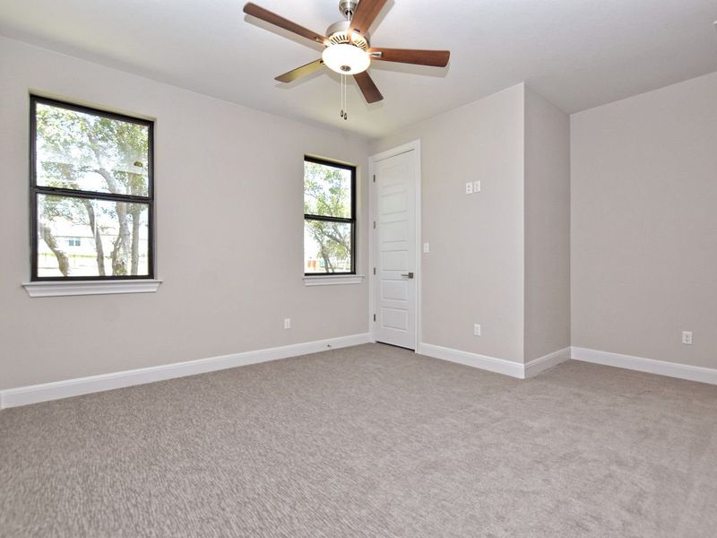 Representative unfurnished interior of a home built from the Avalon by Giddens Homes in Scofield Farms Estates, Georgetown (Image 181).
