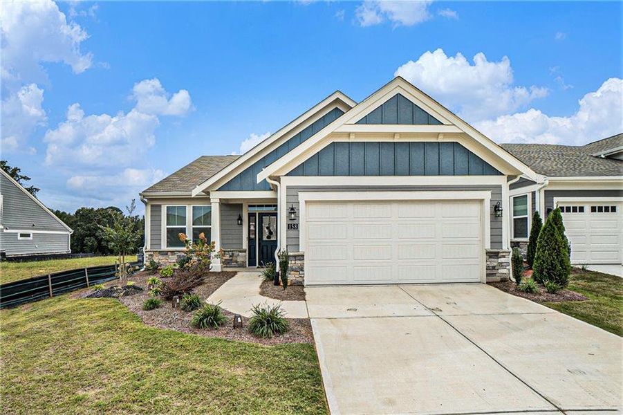 Front exterior of a new home in , Dallas, GA, highlighting curb appeal (Image 23).