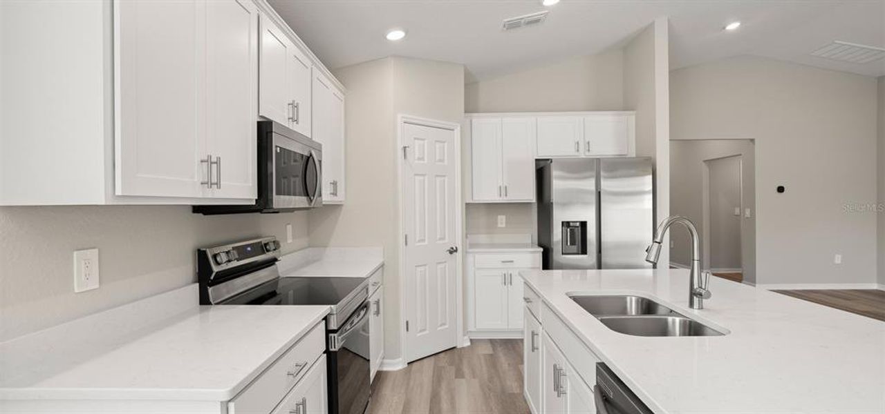 Furnished interior view inside a new home in VillaMar, Winter Haven (Image 9).