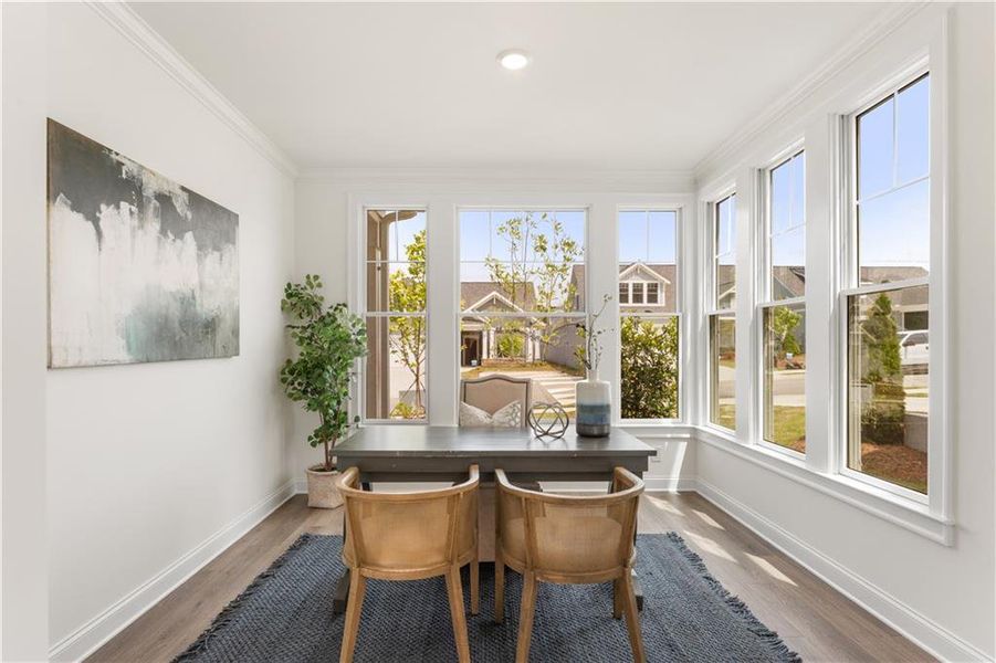 Furnished interior view inside a new home in The Courtyards at Bailey Farms, Dacula (Image 9).