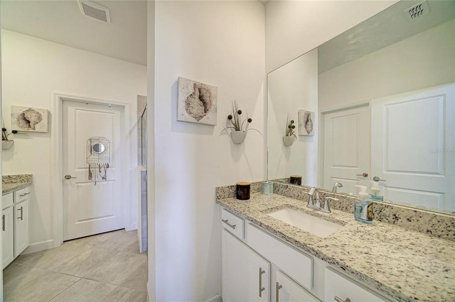 Furnished interior view inside a new home in Lorraine Lakes at Lakewood Ranch, Lakewood Ranch (Image 18). Furnished interior view inside a new home in Lorraine Lakes at Lakewood Ranch, Lakewood Ranch (Image 18).