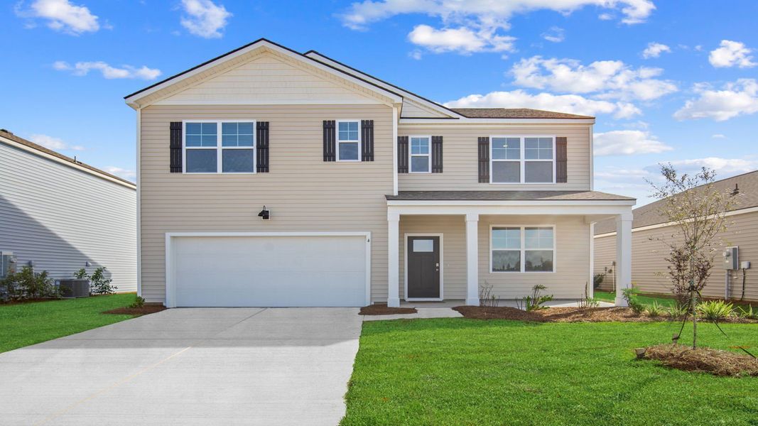 Front exterior of a new home in The Retreat at East Argent, Ridgeland, SC, highlighting curb appeal (Image 1). Front exterior of a new home in The Retreat at East Argent, Ridgeland, SC, highlighting curb appeal (Image 1).