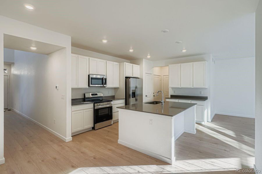 Furnished interior view inside a new home in , Thornton (Image 3).