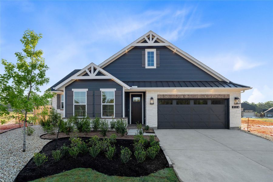 Front exterior of a new home in COLTON, Montgomery, TX, highlighting curb appeal (Image 2). Front exterior of a new home in COLTON, Montgomery, TX, highlighting curb appeal (Image 2).
