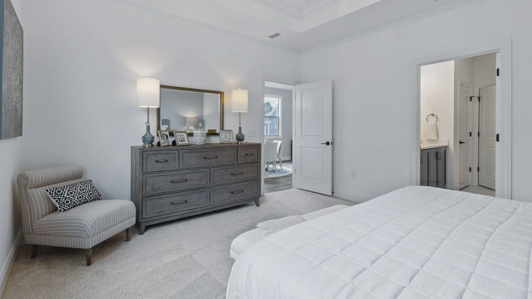 Representative furnished interior of a home built from the Cambridge by Epcon Communities in The Courtyards at Oak Grove, Durham (Image 16).
