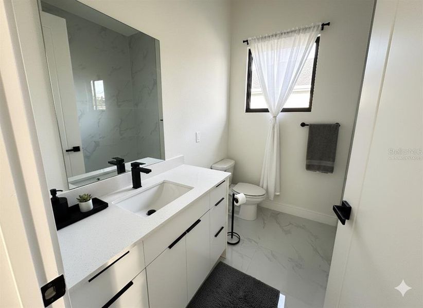 Furnished interior view inside a new home in , Port Charlotte (Image 11).