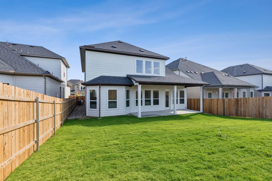 Exterior details and patio area of a home in Edgewood, Leander (Image 16). Exterior details and patio area of a home in Edgewood, Leander (Image 16).