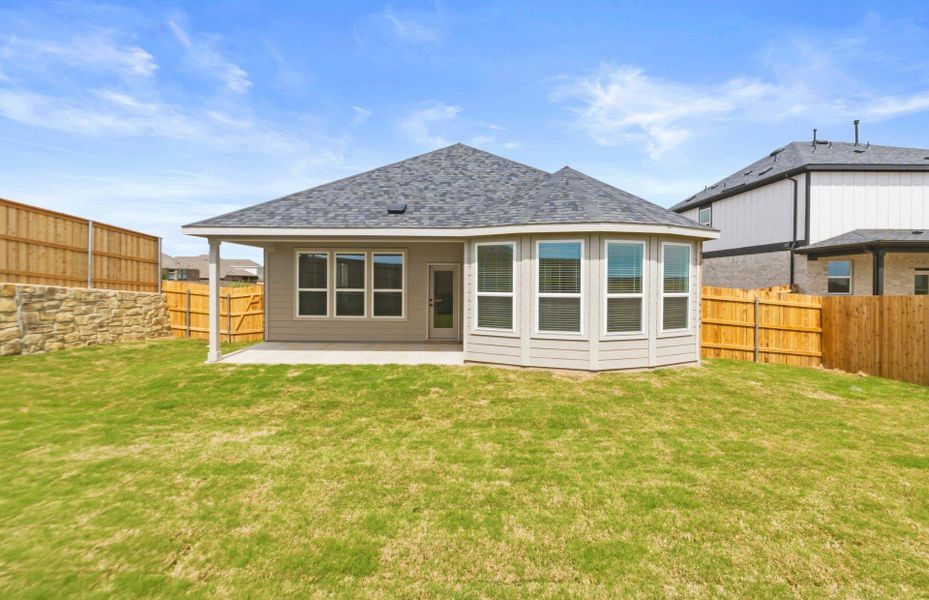 Exterior details and patio area of a home in Sunfield, Buda (Image 19). Exterior details and patio area of a home in Sunfield, Buda (Image 19).