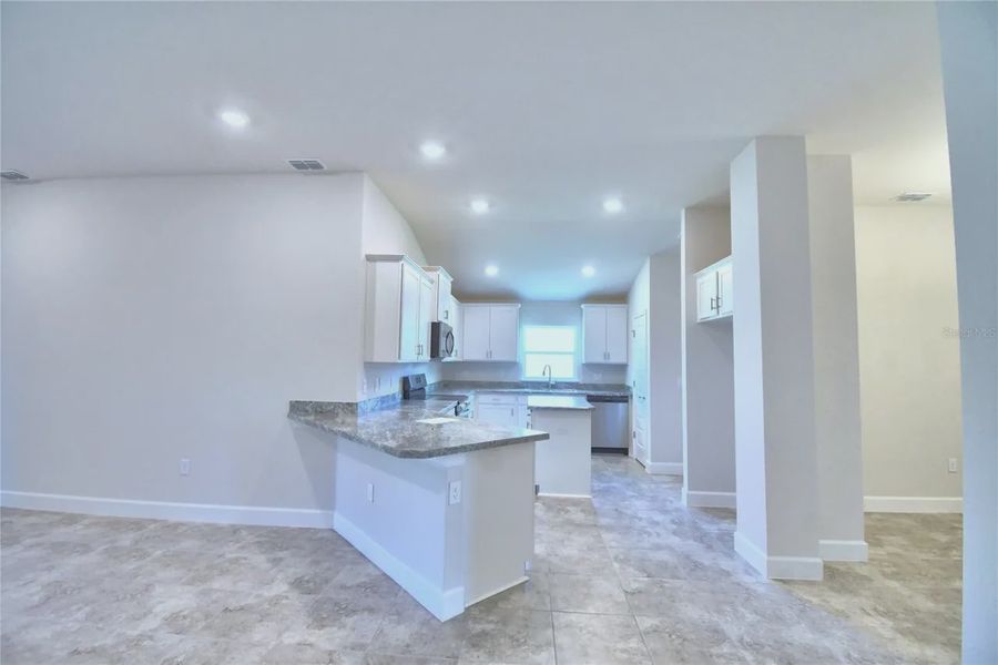 Furnished interior view inside a new home in Cadence Crossing, Auburndale (Image 9).