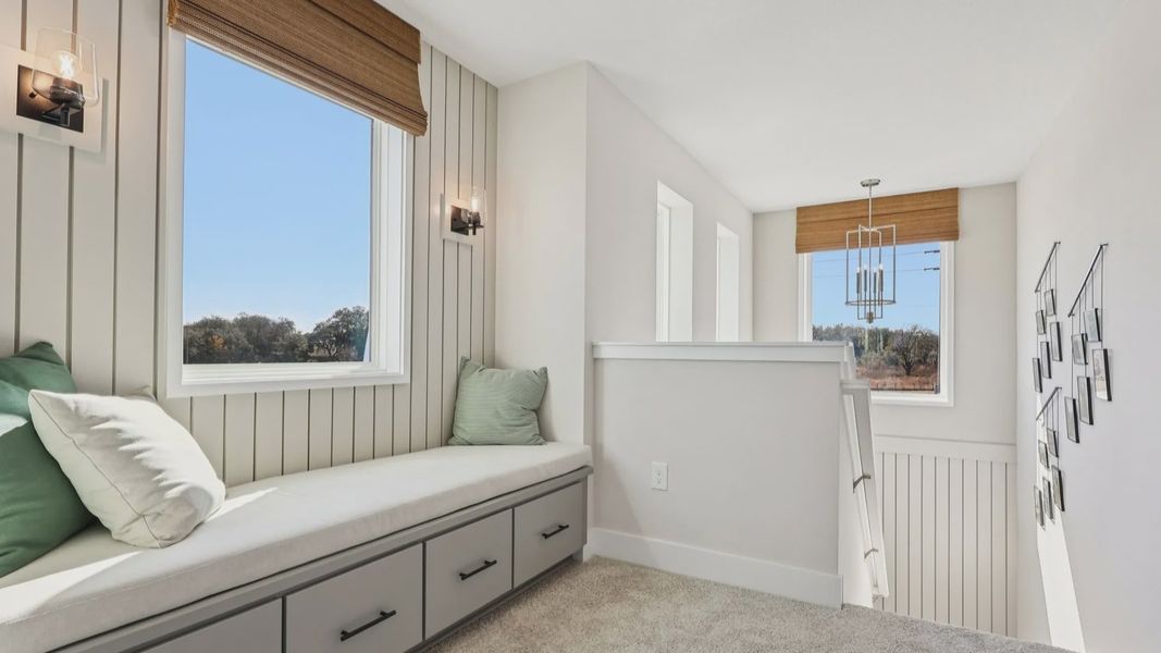 The Mangrove Upstairs Landing with a Cozy Seating Area at Lakeside at Satilla by DRB Homes in Saint Cloud, FL The Mangrove Upstairs Landing with a Cozy Seating Area at Lakeside at Satilla by DRB Homes in Saint Cloud, FL