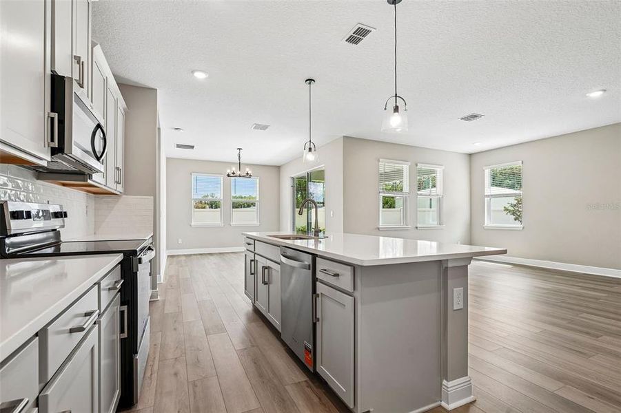 Furnished interior view inside a new home in Legends Preserve - Signature Series, Daytona Beach (Image 14).