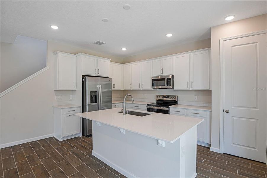 Furnished interior view inside a new home in Seasons at Summit Ridge, Apopka (Image 9).