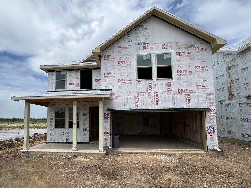 Front exterior of a new home in Rolling Glen, Hutto, TX, highlighting curb appeal (Image 12). Front exterior of a new home in Rolling Glen, Hutto, TX, highlighting curb appeal (Image 12).