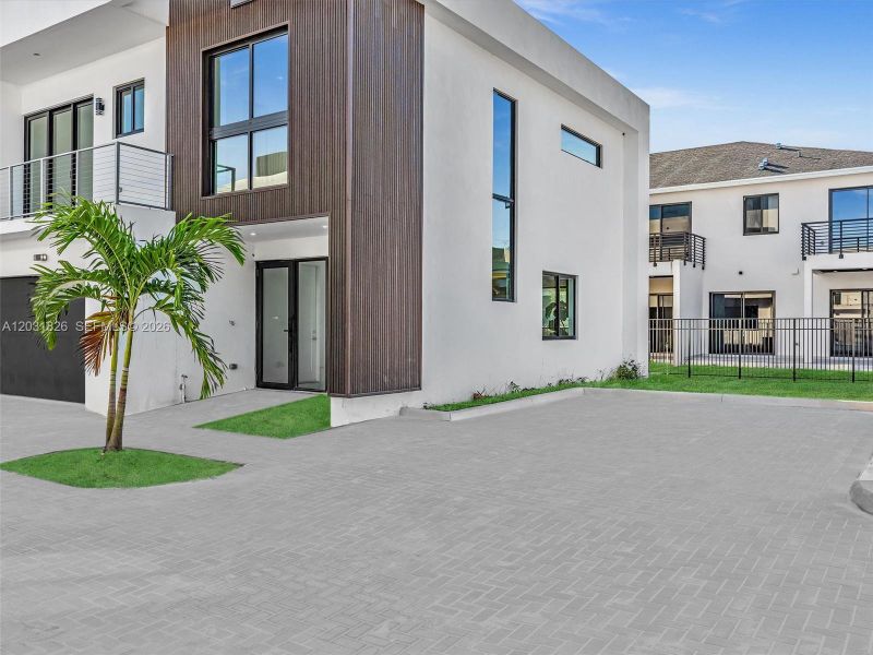Exterior details and patio area of a home in , Dania Beach (Image 54).