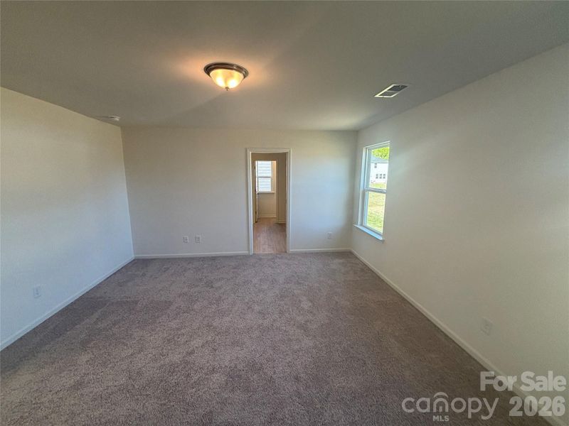 Spacious, unfurnished interior of a new home in Bellina, York (Image 14).