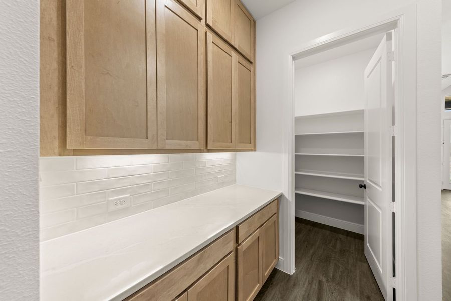 Furnished interior view inside a new home in Lily Creek at Sutton Fields, Aubrey (Image 11).