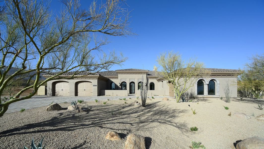 Front exterior of a new home in Rosewood Highlands at Storyrock, Scottsdale, AZ, highlighting curb appeal (Image 16).
