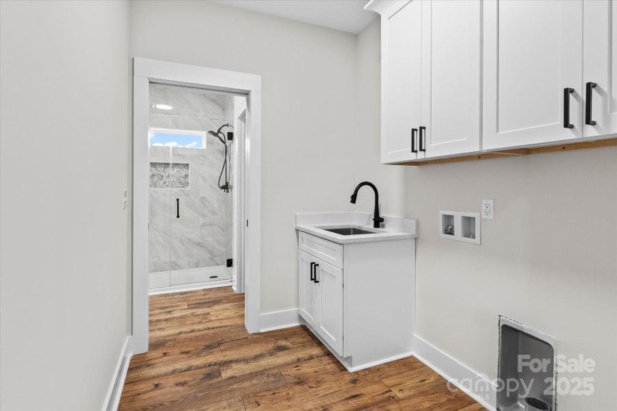 Laundry w/access from Primary Bath and Drop Zone/Hallway Laundry w/access from Primary Bath and Drop Zone/Hallway