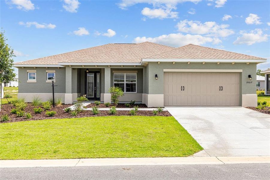 Front exterior of a new home in , Ocala, FL, highlighting curb appeal (Image 19). Front exterior of a new home in , Ocala, FL, highlighting curb appeal (Image 19).
