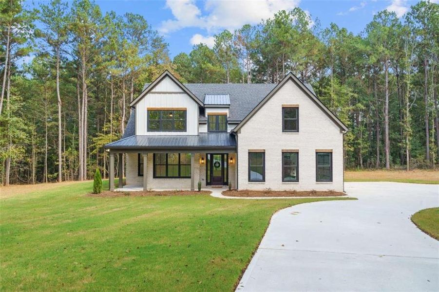 Front exterior of a new home in , Jenkinsburg, GA, highlighting curb appeal (Image 30).