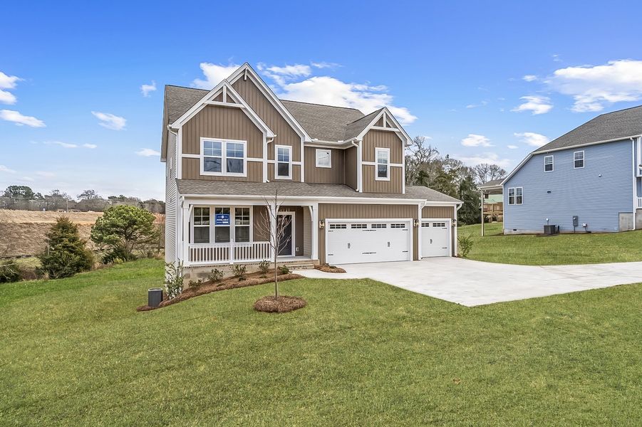 Front exterior of a new home in Ridgecrest at Midway, Anderson, SC, highlighting curb appeal (Image 24).