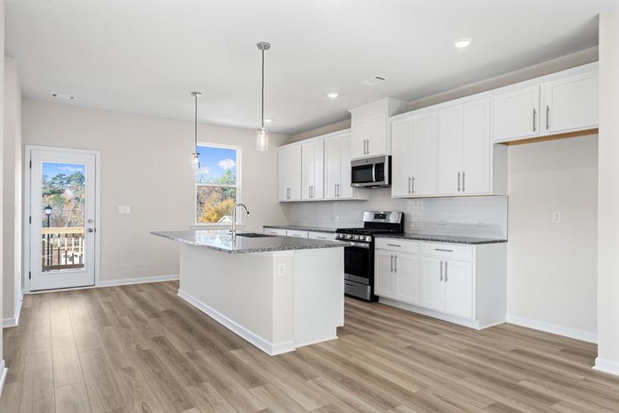Representative furnished interior of a home built from the Collins by Taylor Morrison in Henson Square, Lawrenceville (Image 20).