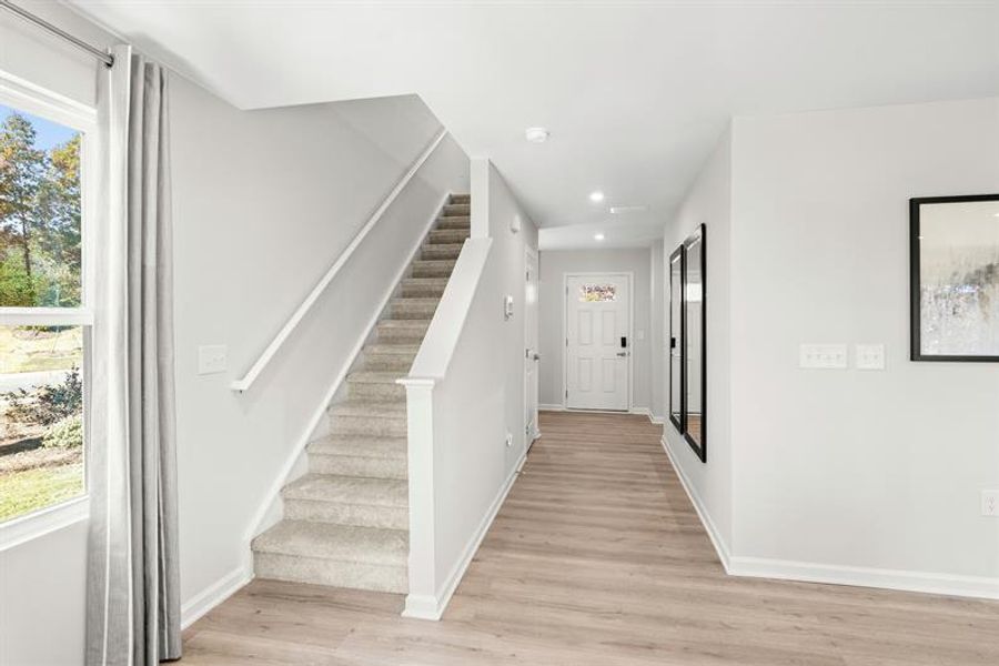 Representative unfurnished interior of a home built from the Woodford by Ryan Homes in Oakwood Trace, Fairburn (Image 17).