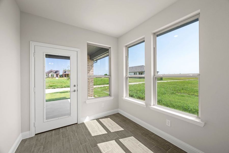 Front exterior of a new home in Redden Farms – Active Adult, Midlothian, TX, highlighting curb appeal (Image 26). Front exterior of a new home in Redden Farms – Active Adult, Midlothian, TX, highlighting curb appeal (Image 26).