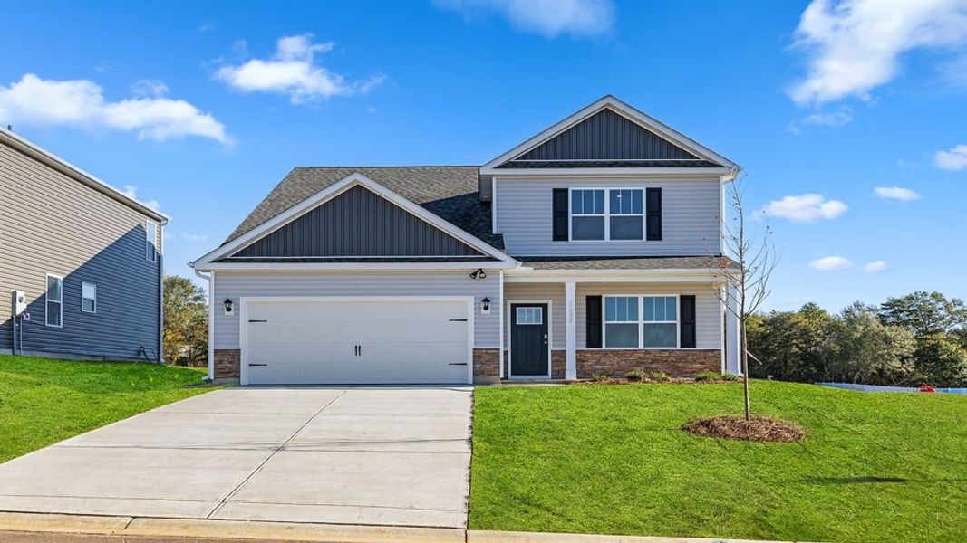 Front exterior of a new home in Sage Grove, Lyman, SC, highlighting curb appeal (Image 1).