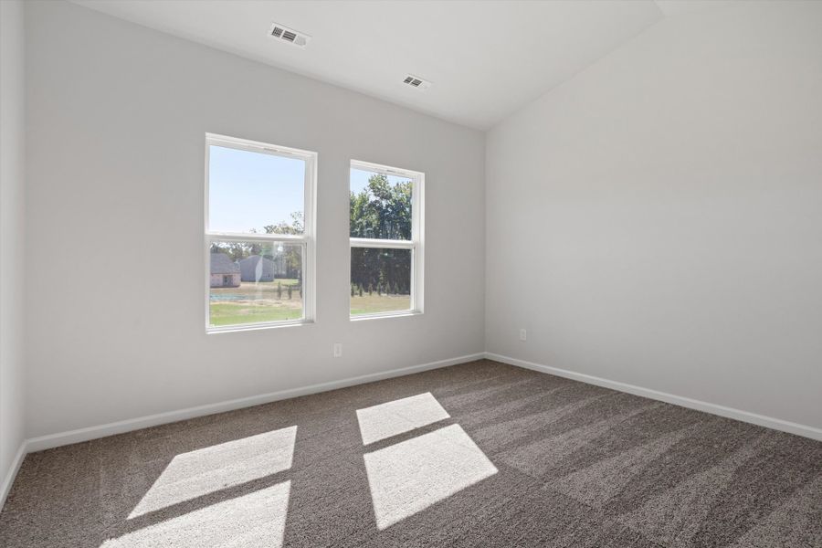 Spacious, unfurnished interior of a new home in Cambridge Reserve, Angier (Image 19).