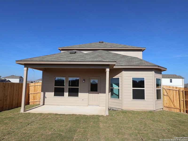 Exterior details and patio area of a home in Winding Brook, San Antonio (Image 18).